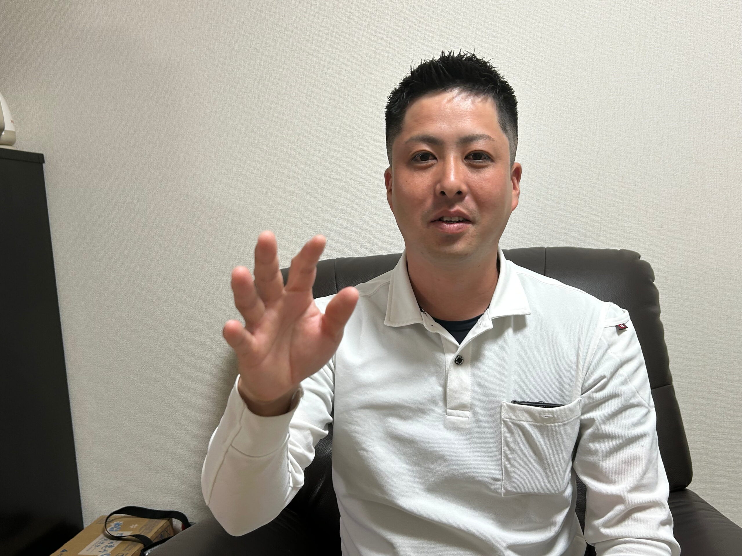 追加費用について説明する豊喜代表
